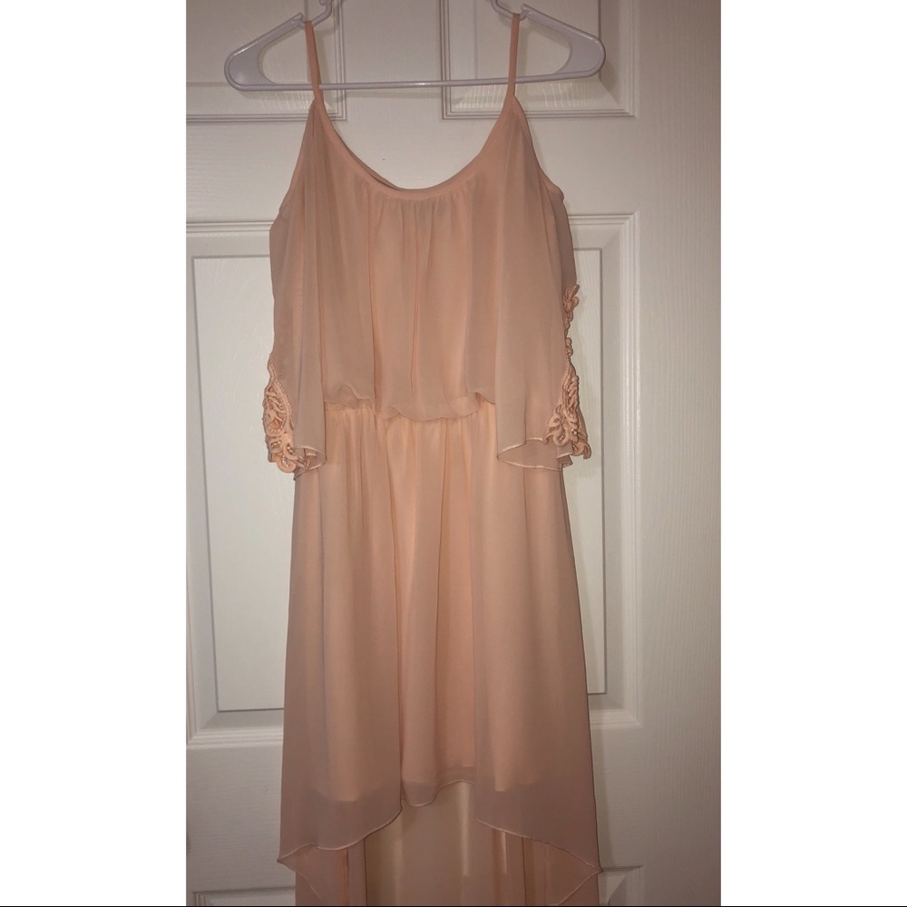 Peach hi-low dress with a slit shoulder